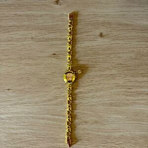 Stylish Retro watch with a golden heart band.